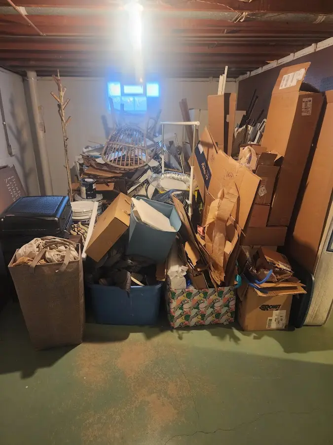 Roll-off dumpster container at job site for Yard Waste Dumpster Rental in Lakewood